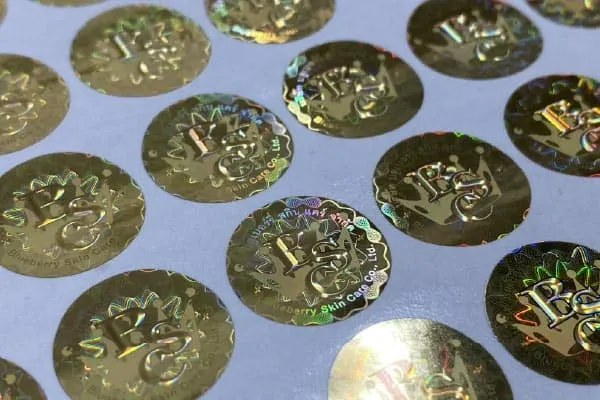 สติกเกอร์โฮโลแกรมกันปลอมสีทอง | Gold Hologram Anti-Counterfeit Label สติกเกอร์กันปลอมโฮโลแกรมสีทองทรงกลม ป้องกันการปลอมแปลงสินค้า Anti-Counterfeit Security Label